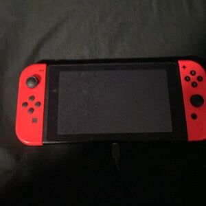 Nintendo switch with charger and case